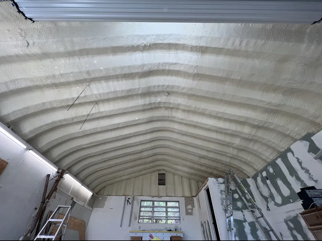 Spray polyurethane foam applied to the underside of a metal roof deck in Elk Grove